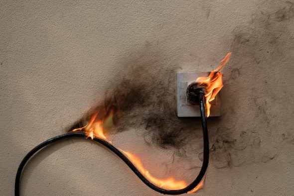 Overloaded electric socket and plug got fire